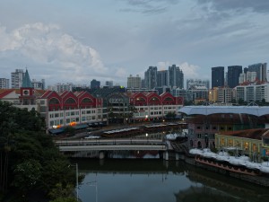 In early morning, when most lights were still on, Singapore River flew quitely through Clarke Quay, Singapore.